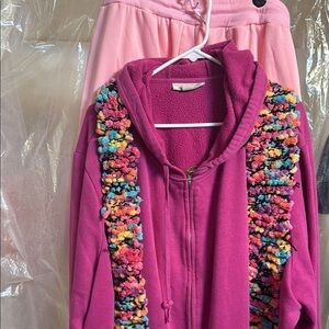 Pink hoodie with pink sweats and svarf